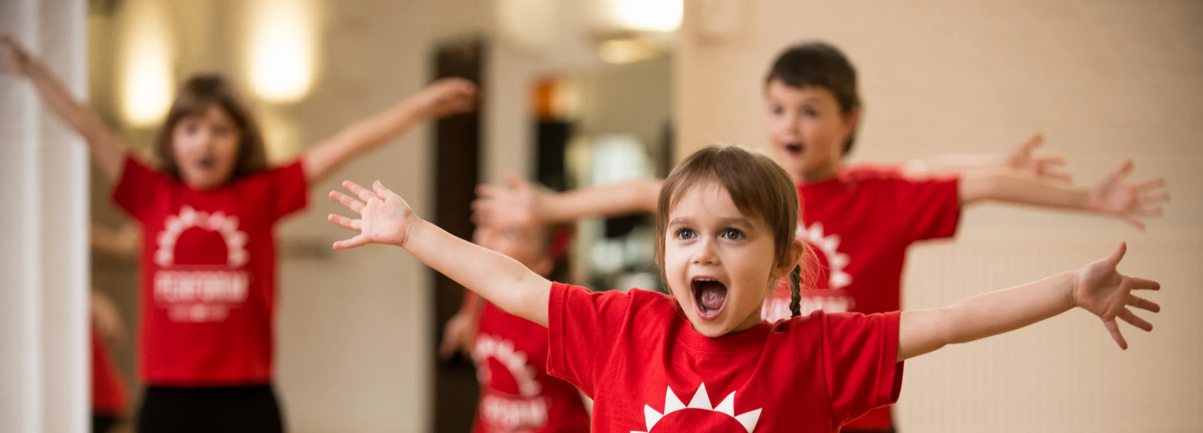 Children performing in a dance class